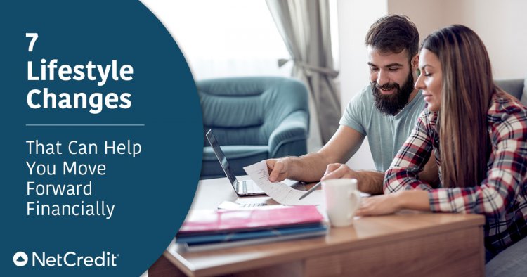blog post about financial goals with photo of middle-aged couple sitting at a desk discussing paperwork