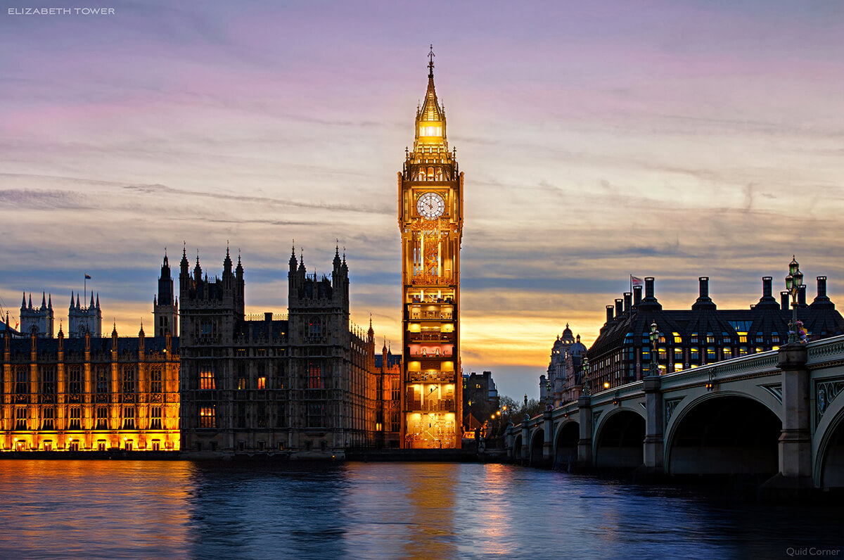 evening view of Big Ben, the famous clock town in london, over a river